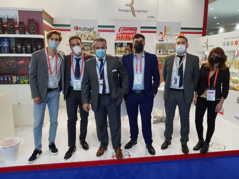 Staff stand Italia Romagna Coop Food at Gulfood